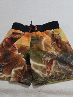 JURASSIC WORLD SWIM TRUNKS